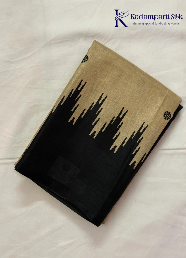 Kadamparii Silk beige and black semi tussar silk saree with abstract design and subtle motif detailing, displayed on a white background.