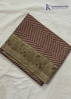 Kadamparii Silk beige tussar silk saree with maroon chevron design and decorative border, displayed on a white background.