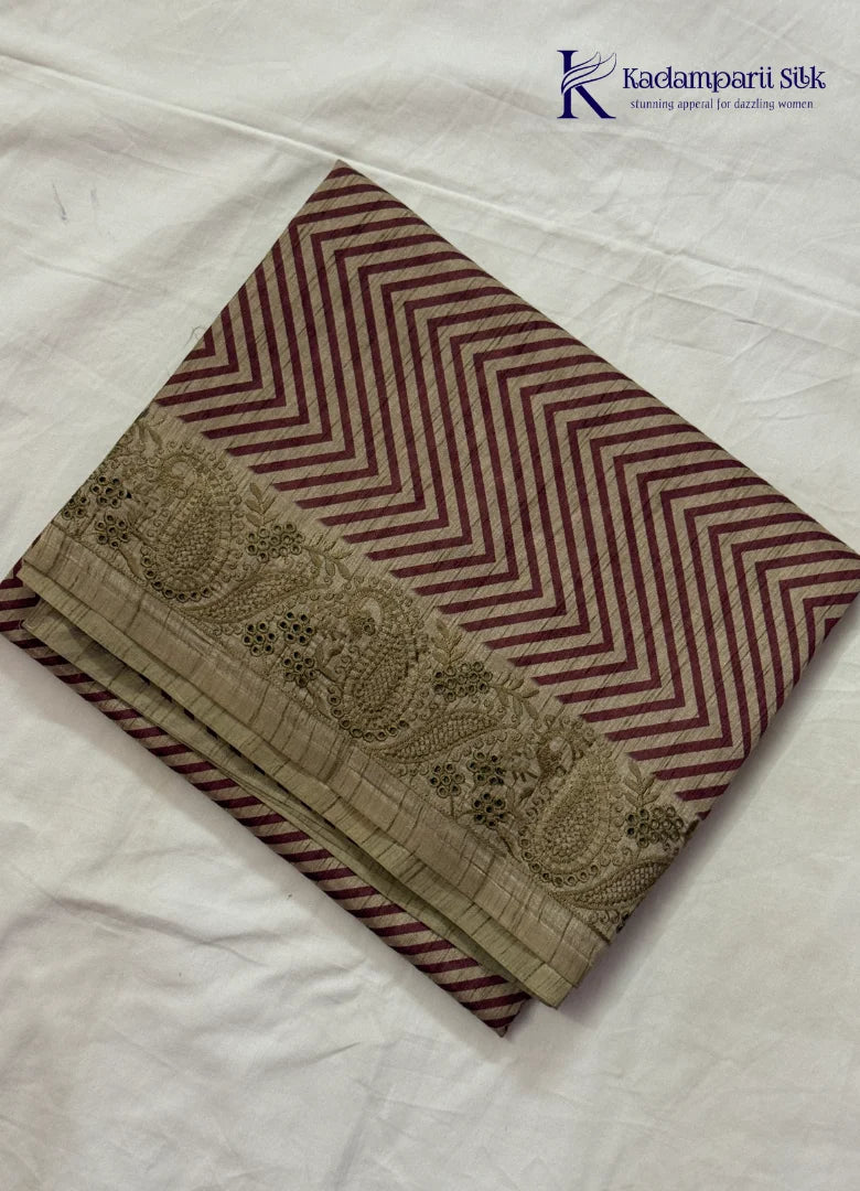 Kadamparii Silk beige tussar silk saree with maroon chevron design and decorative border, displayed on a white background.