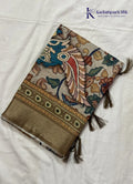Kadamparii Silk beige soft tussar silk saree with Kalamkari style floral print and traditional border, displayed on a white background.
