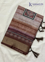 Kadamparii Silk brown soft tussar silk saree with digital print body and traditional motif border, displayed on a white background.