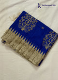 Kadamparii Silk royal blue tussar cutwork saree with floral motifs and contrasting beige cutwork border, displayed on a white background.