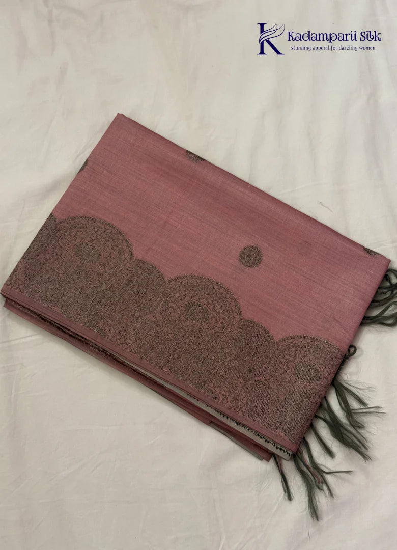 Kadamparii Silk dusty pink raw silk saree with antique zari border and subtle motif detailing, displayed on a white background.