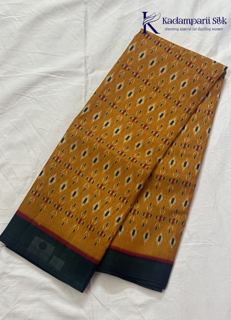 Kadamparii Silk mustard soft semi tussar silk saree with woven pattern and dark contrast border, displayed on a white background.