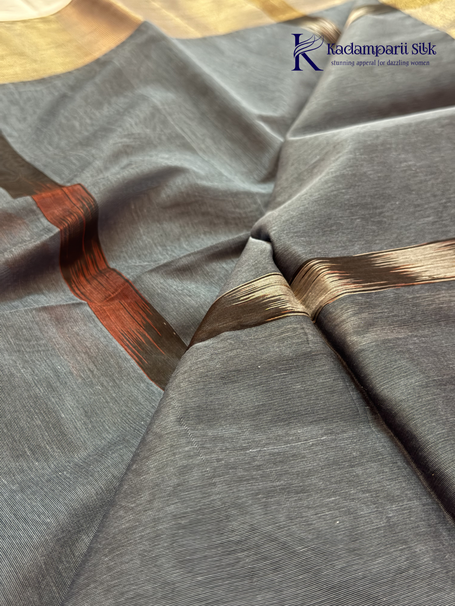 Kadamparii Silk blue Pochampally silk cotton saree with bold ikat geometric patterns, golden zari border, soft lightweight fabric, elegant tassels, and traditional handloom-inspired ethnic design.