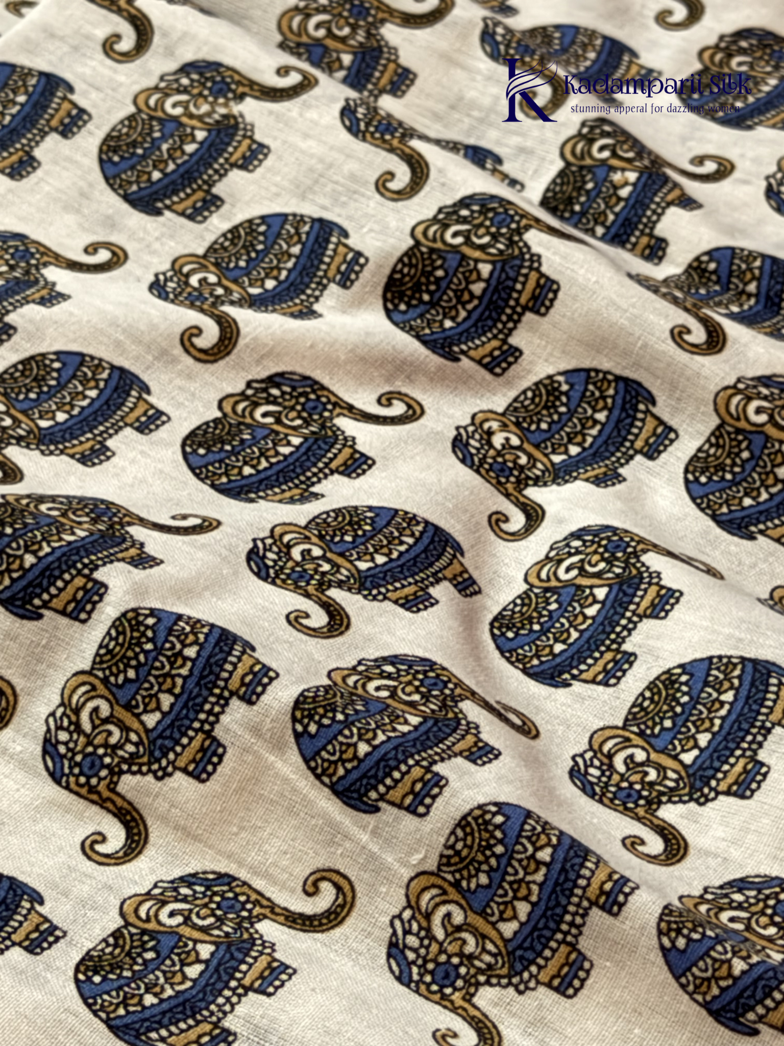 Kadamparii Silk royal blue soft ikkat cotton saree with subtle zari border and matching elephant printed blouse, lightweight breathable fabric, elegant traditional design, and comfortable daily wear style.