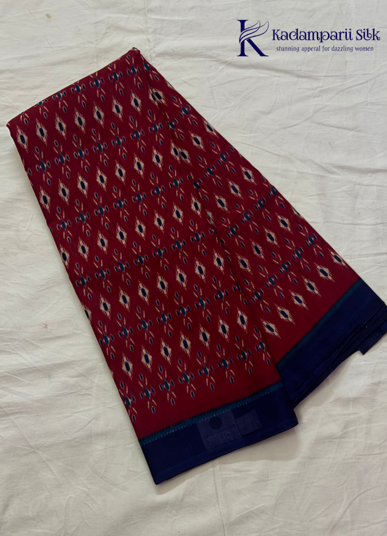 Kadamparii Silk maroon soft semi tussar silk saree with woven pattern and navy blue contrast border, displayed on a white background.