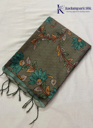 Kadamparii Silk sea green semi tussar silk saree with floral printed mundhi and elegant border, displayed on a white background.