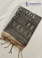 Kadamparii Silk black semi tussar silk saree with traditional printed mundhi and beige border, displayed on a white background.