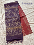 Blush pink semi tussar saree with traditional batik print and purple contrast pallu by Kadamparii Silk.