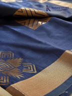 Kadamparii Silk navy blue semi soft silk saree with vibrant magenta zari woven pallu, intricate checkered motifs, copper gold zari border, and elegant tassel detailing.