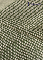 Kadamparii Silk olive green soft tussar silk saree with textured woven body and silver zari border, displayed on a white background.