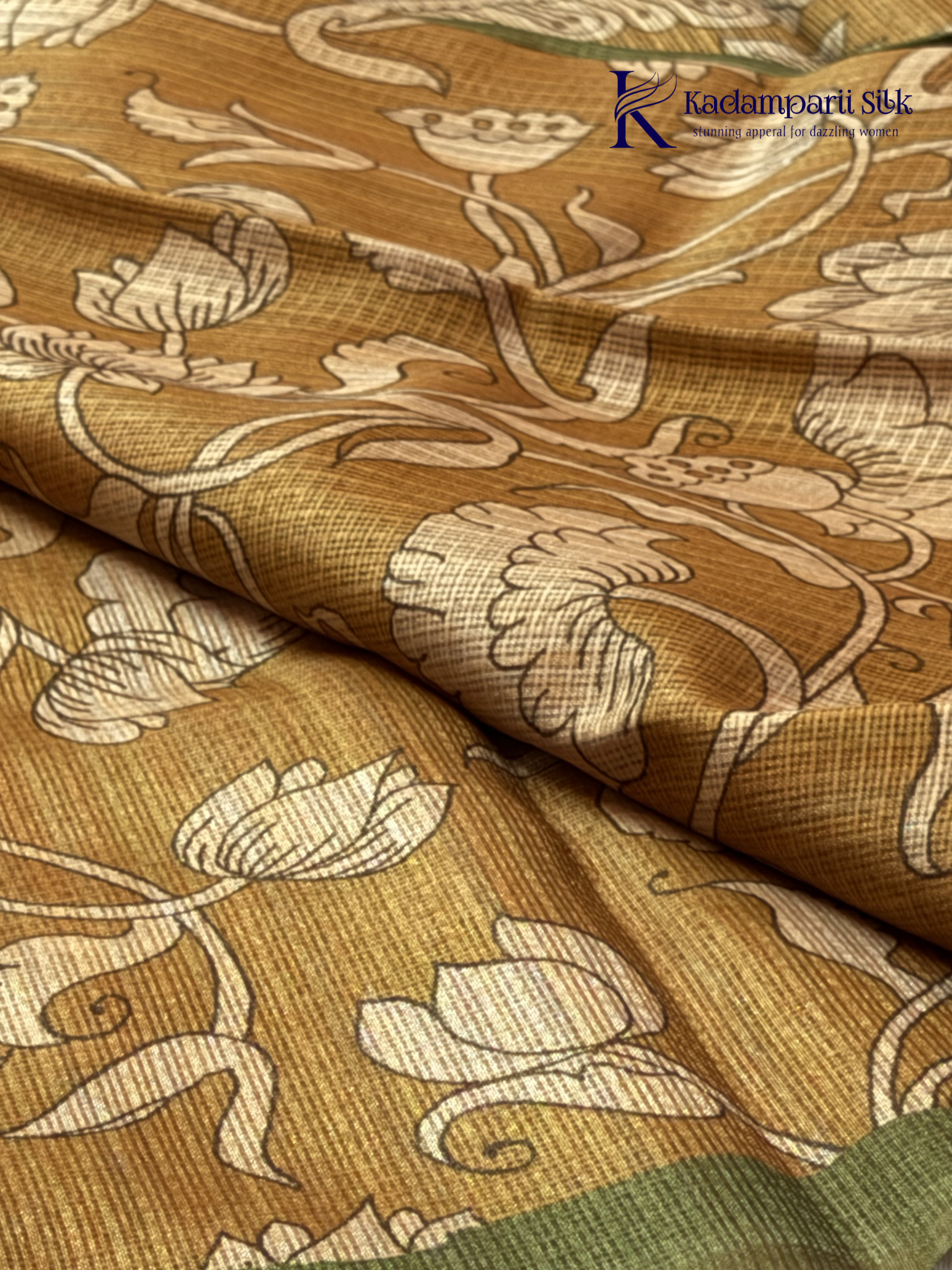 Mustard kota silk saree with floral Kalamkari print and contrast border by Kadamparii Silk.