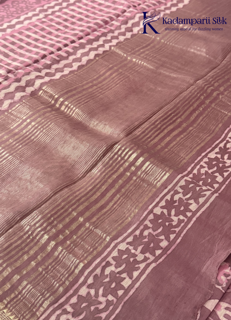 Kadamparii Silk mauve pink soft cotton saree with floral design and zari border, displayed on a white background.