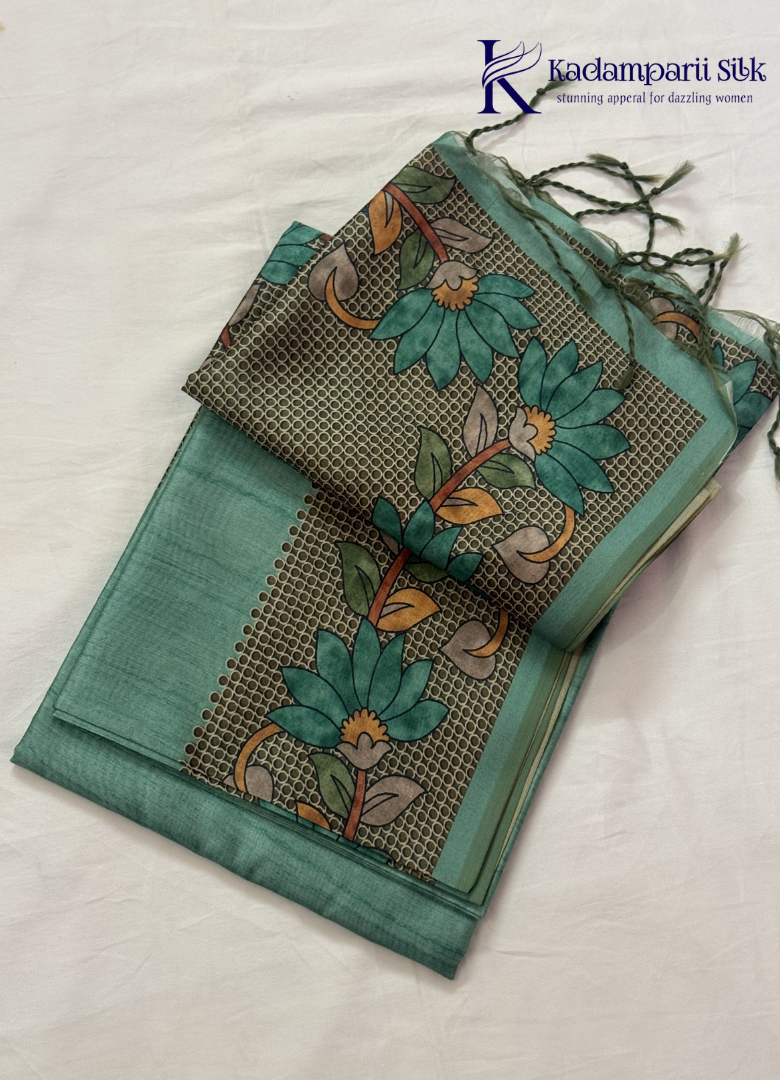 Kadamparii Silk sea green semi tussar silk saree with floral printed mundhi and elegant border, displayed on a white background.