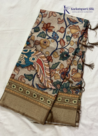 Kadamparii Silk beige soft tussar silk saree with Kalamkari style floral print and traditional border, displayed on a white background.