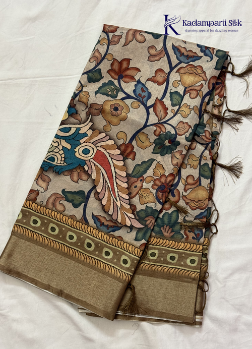 Kadamparii Silk beige soft tussar silk saree with Kalamkari style floral print and traditional border, displayed on a white background.