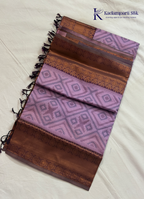 Kadamparii Silk lavender semi silk saree with Pochampally design and rich woven border, displayed on a white background.