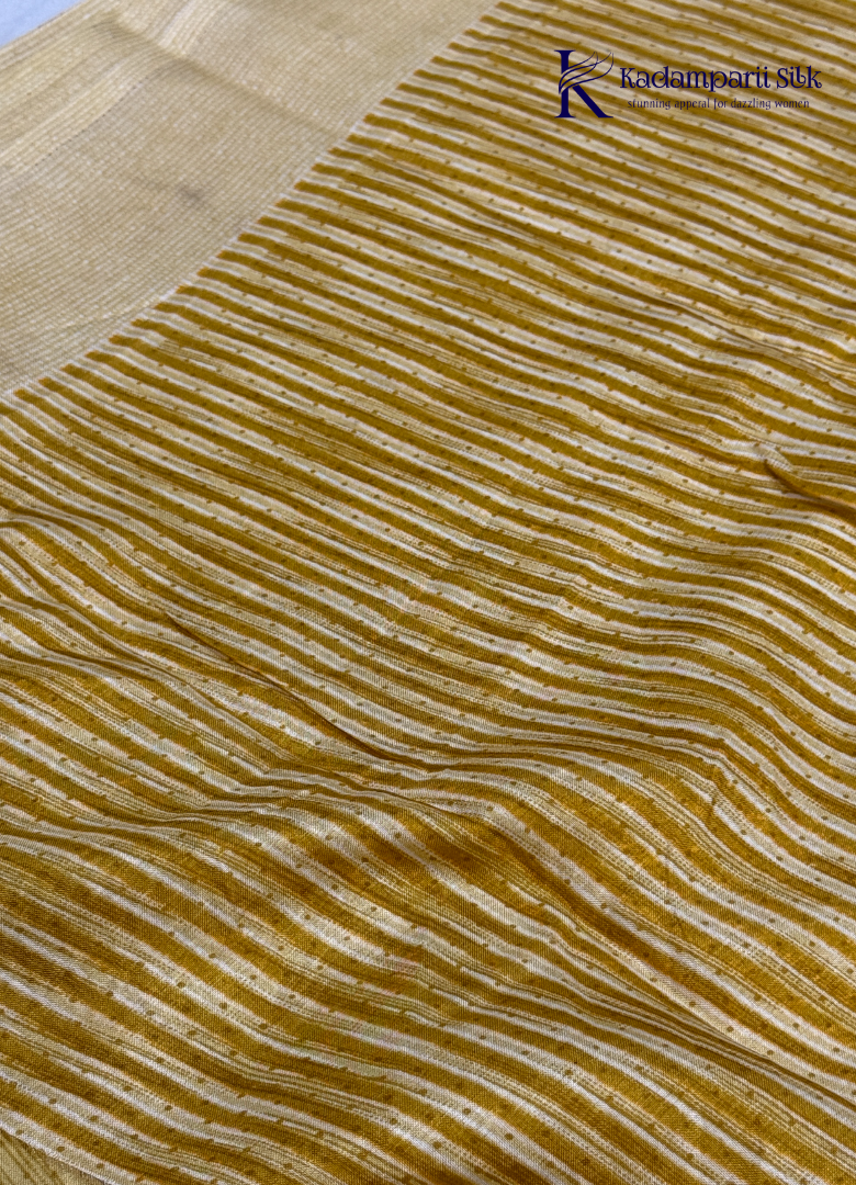 This Sunshine Yellow Semi Soft Silk Saree features a beautifully textured woven body paired with a shimmering zari border, creating a perfect balance of simplicity and sophistication. Lightweight, graceful, and versatile—an ideal choice for festive occasions, office wear, and special gatherings.