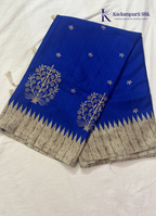 Kadamparii Silk royal blue tussar cutwork saree with floral motifs and contrasting beige cutwork border, displayed on a white background.
