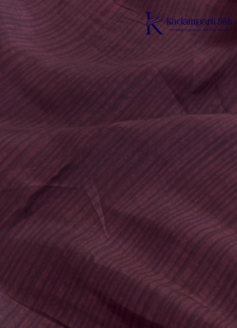 Kadamparii Silk beige semi tussar silk printed saree with wine colour pattern and matching striped border, displayed on a white background.