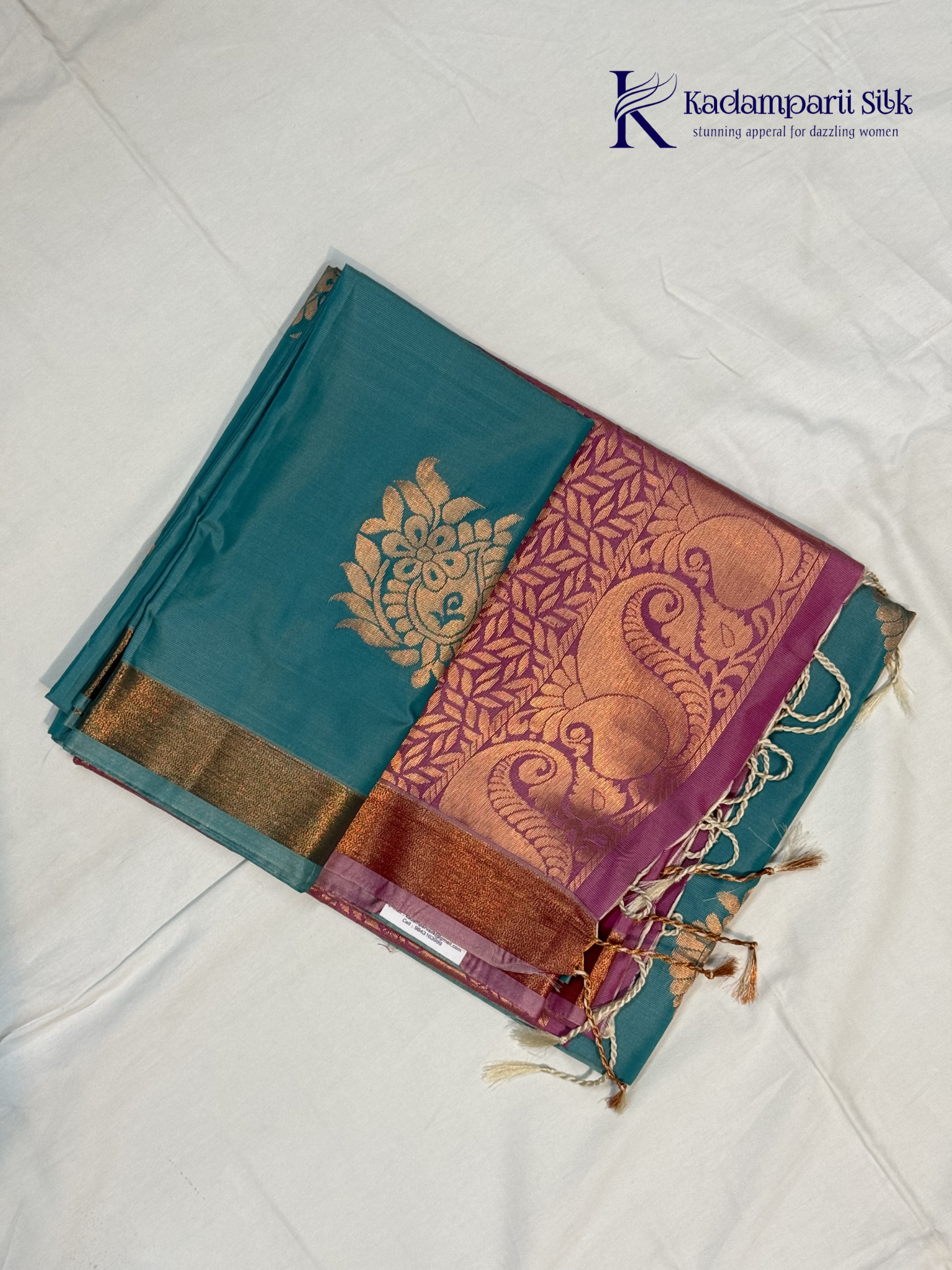 Kadamparii Silk aqua blue semi soft silk saree with magenta zari woven pallu, intricate paisley motifs, floral zari patterns, copper gold border, elegant tassels, and traditional festive design