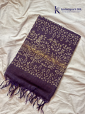 Blush pink semi tussar saree with traditional batik print and purple contrast pallu by Kadamparii Silk.