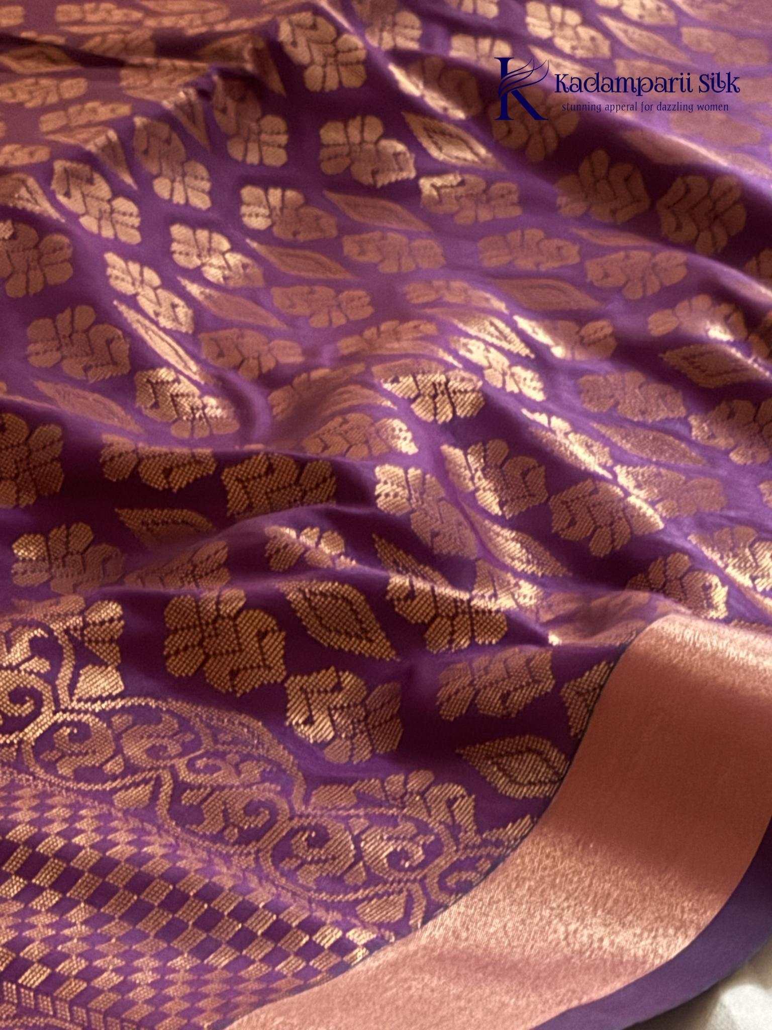 Kadamparii Silk navy blue semi soft silk saree with vibrant magenta zari woven pallu, intricate checkered motifs, copper gold zari border, and elegant tassel detailing.