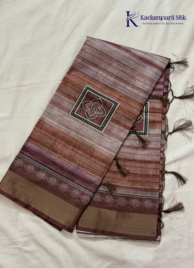 Kadamparii Silk brown soft tussar silk saree with digital print body and traditional motif border, displayed on a white background.