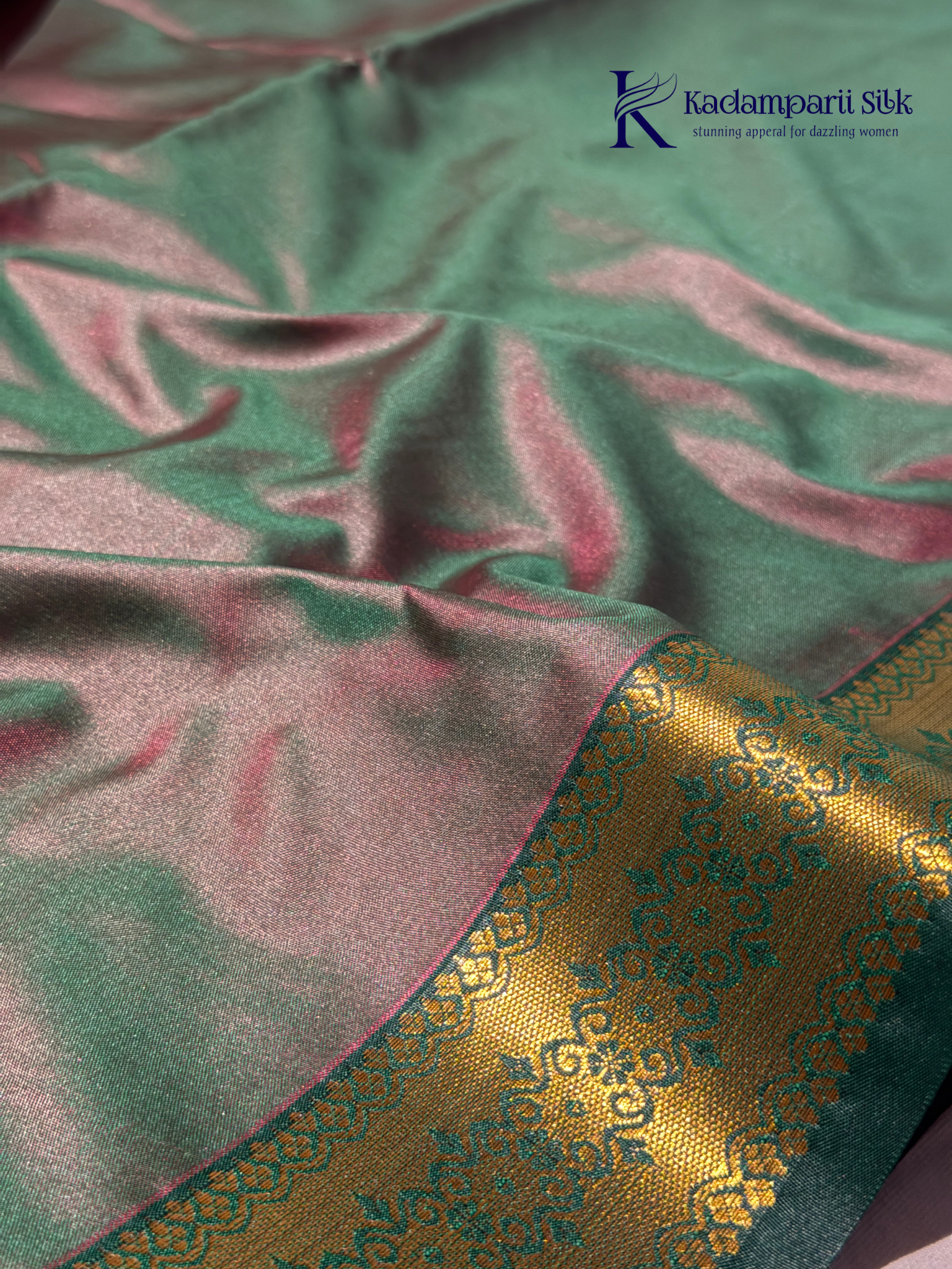 Kadamparii Silk magenta and olive green semi soft silk saree with intricate gold zari weaving, traditional motifs, rich contrast pallu, elegant border, and tassel detailing.