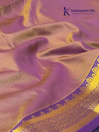 Kadamparii Silk olive green semi soft silk saree with gold zari peacock motifs, rich purple woven pallu, intricate zari border, and tassel detailing.