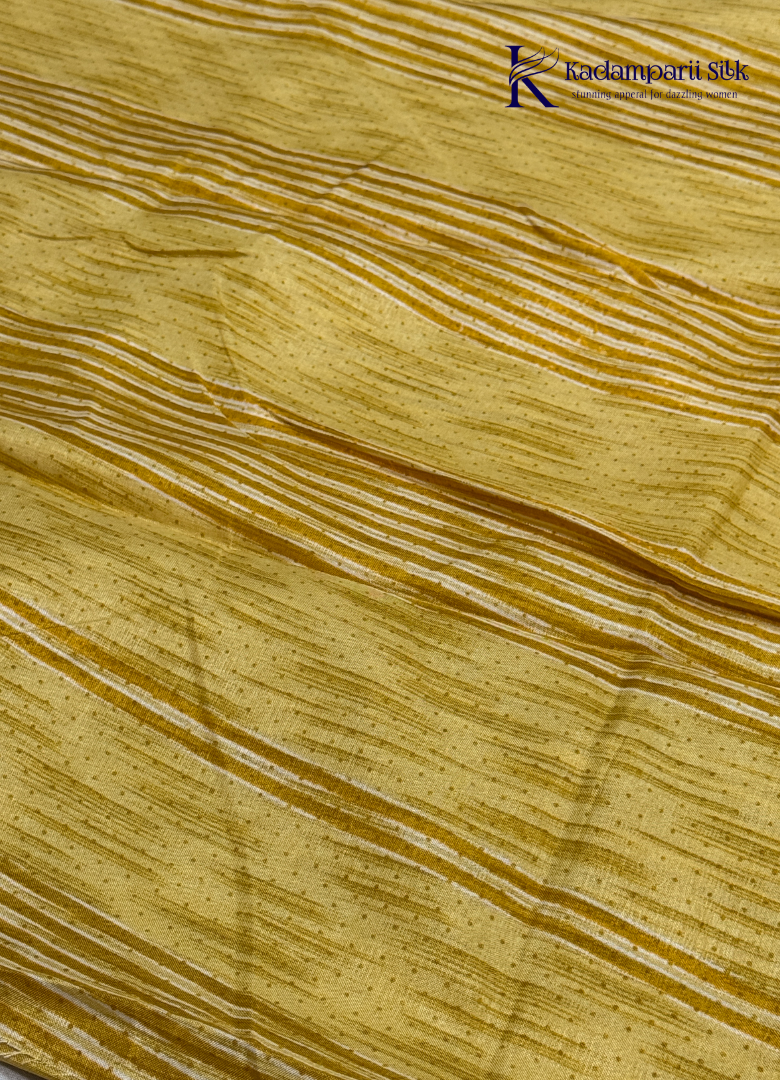 This Sunshine Yellow Semi Soft Silk Saree features a beautifully textured woven body paired with a shimmering zari border, creating a perfect balance of simplicity and sophistication. Lightweight, graceful, and versatile—an ideal choice for festive occasions, office wear, and special gatherings.