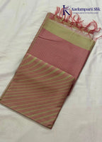 Kadamparii Silk rose pink semi raw silk saree with striped design and contrast border, displayed on a white background.