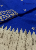 Kadamparii Silk royal blue tussar cutwork saree with floral motifs and contrasting beige cutwork border, displayed on a white background.