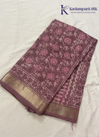 Kadamparii Silk mauve pink soft cotton saree with floral design and zari border, displayed on a white background.
