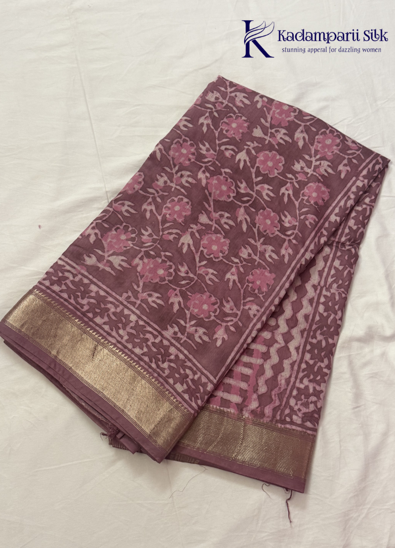 Kadamparii Silk mauve pink soft cotton saree with floral design and zari border, displayed on a white background.