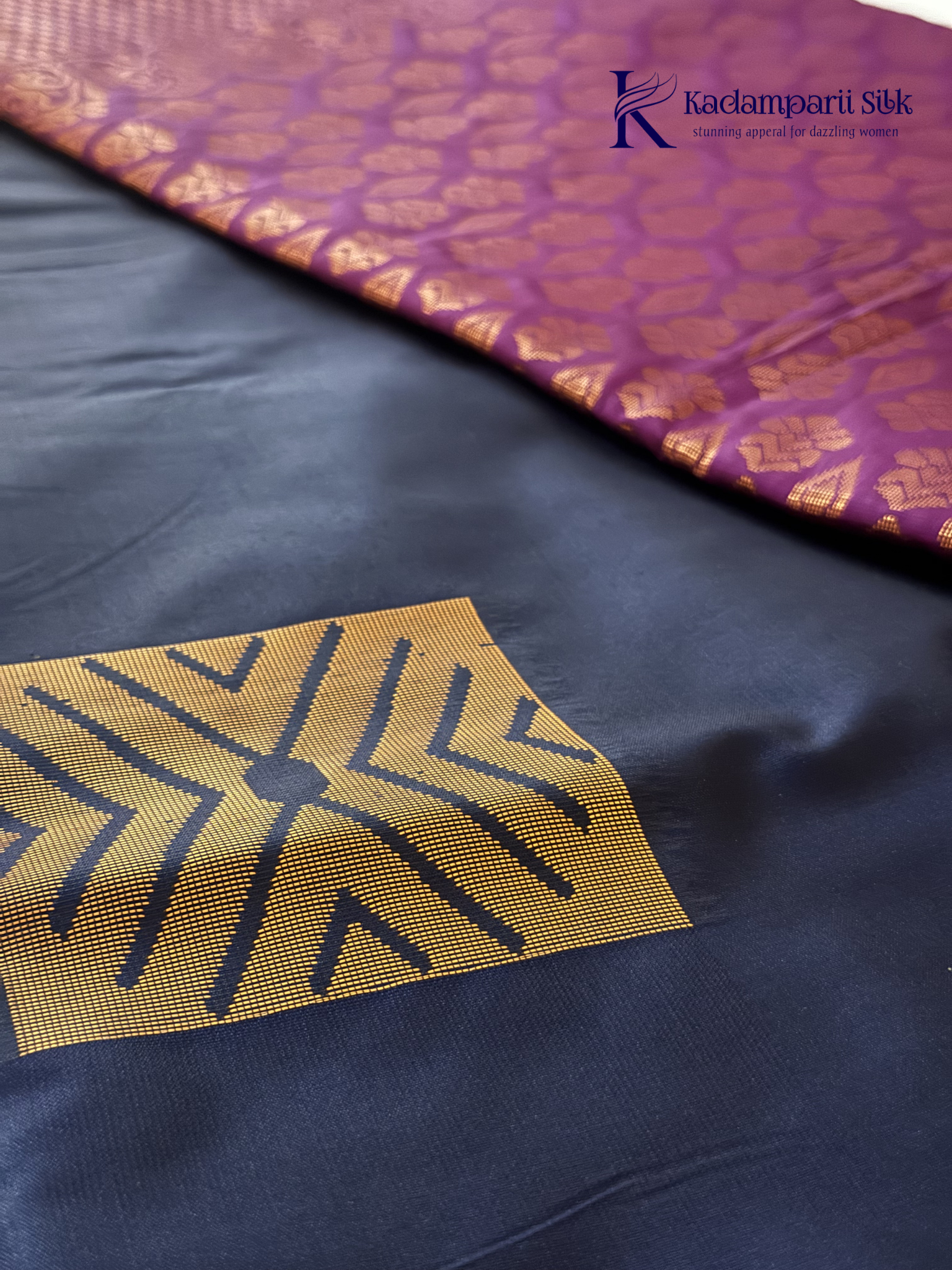 Kadamparii Silk navy blue semi soft silk saree with vibrant magenta zari woven pallu, intricate checkered motifs, copper gold zari border, and elegant tassel detailing.