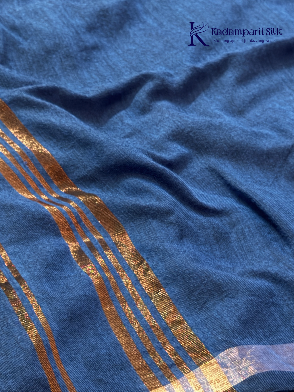 Kadamparii Silk royal blue soft ikkat cotton saree with subtle zari border and matching elephant printed blouse, lightweight breathable fabric, elegant traditional design, and comfortable daily wear style.