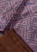 Kadamparii Silk lavender semi silk saree with Pochampally design and rich woven border, displayed on a white background.