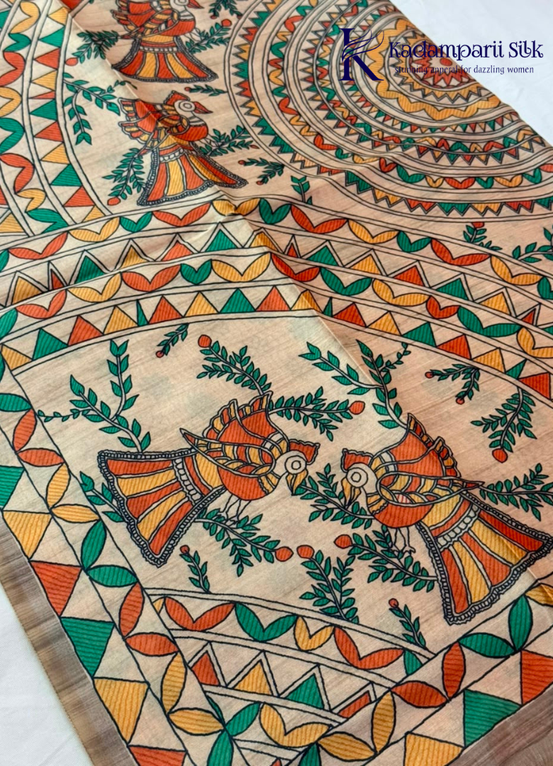 Kadamparii Silk taupe grey semi tussar silk saree with artistic printed mundhi, floral leaf motifs, and multicolour border, displayed on a white background.