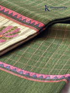 Olive green semi kota saree with checked pattern and artistic printed border by Kadamparii Silk.