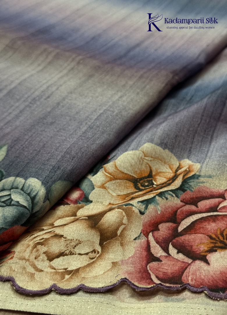 Kadamparii Silk grey tussar saree with digital body and multicolour floral border, displayed on a white background.