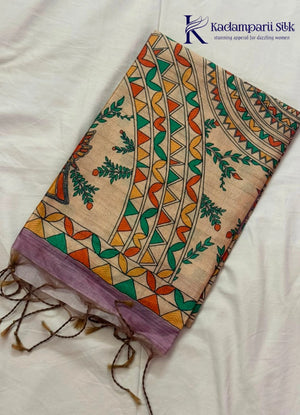 Kadamparii Silk lavender semi tussar silk saree with artistic printed mundhi, floral leaf motifs, and multicolour border, displayed on a white background.
