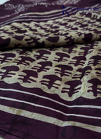 Kadamparii Silk beige semi tussar silk printed saree with wine colour pattern and matching striped border, displayed on a white background.