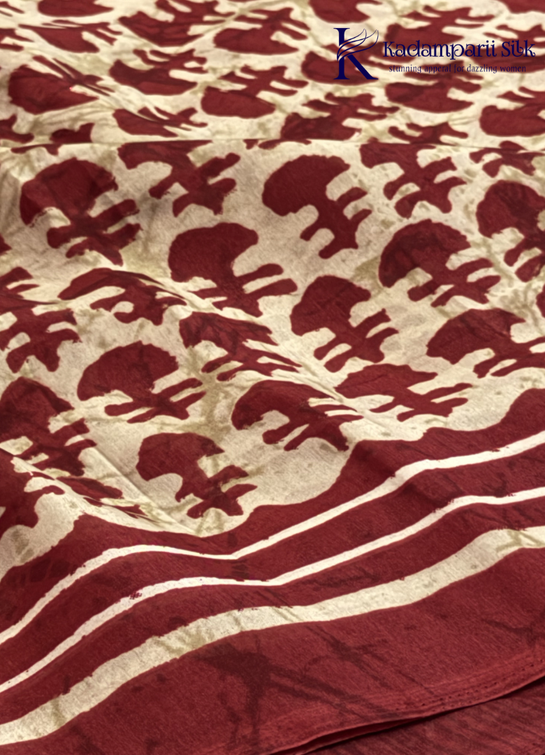 Kadamparii Silk beige semi tussar silk saree with maroon printed pattern and matching striped border, displayed on a white background.