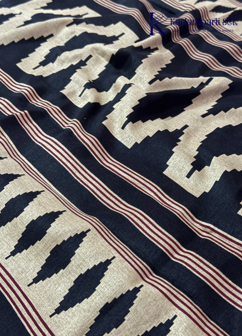 Kadamparii Silk beige and black semi tussar silk saree with abstract design and subtle motif detailing, displayed on a white background.
