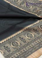 Kadamparii Silk black semi tussar silk saree with traditional printed mundhi and beige border, displayed on a white background.