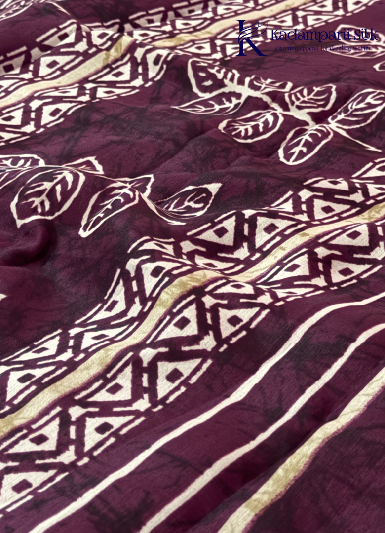 Kadamparii Silk beige semi tussar silk printed saree with wine colour pattern and matching striped border, displayed on a white background.