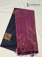 Kadamparii Silk navy blue semi soft silk saree with vibrant magenta zari woven pallu, intricate checkered motifs, copper gold zari border, and elegant tassel detailing.