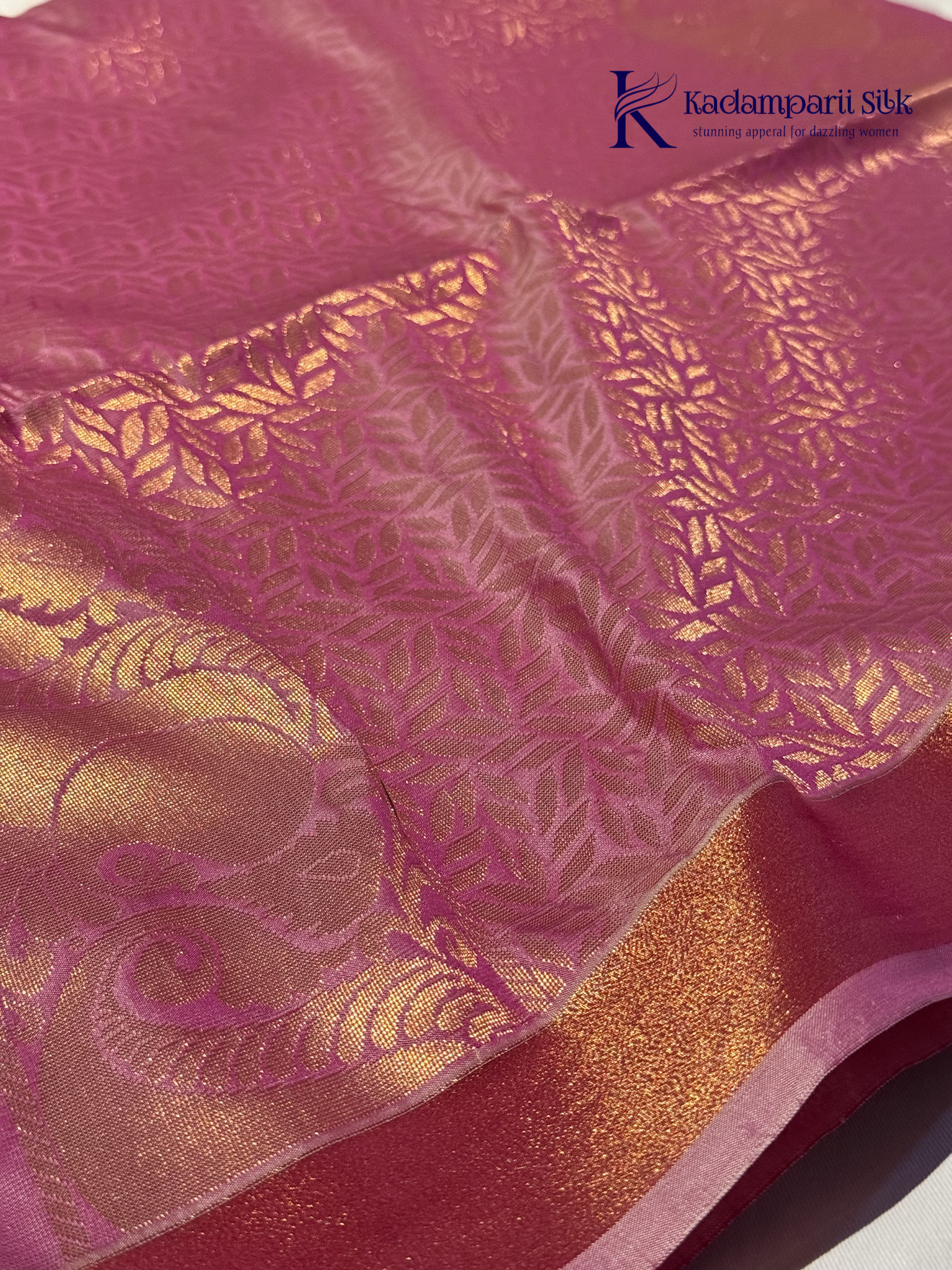 Kadamparii Silk aqua blue semi soft silk saree with magenta zari woven pallu, intricate paisley motifs, floral zari patterns, copper gold border, elegant tassels, and traditional festive design.